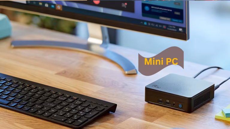 Mini PC compact desktop computer showing small form factor size comparison with keyboard and monitor setup for office home server gaming use 2026